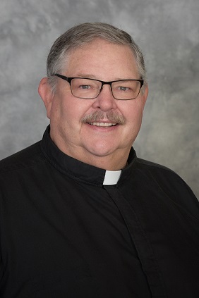 Father Bryan D. Ernest, Pastor